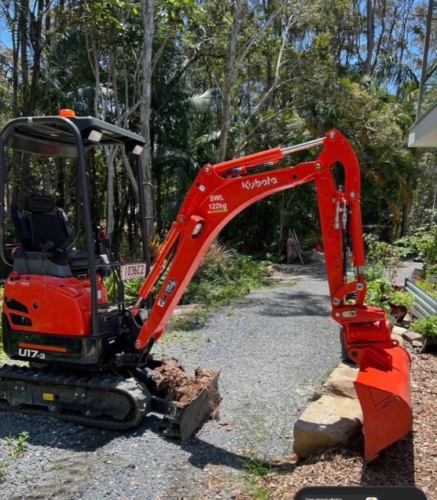Kubota mini excavator on residential driveway Gold Coast